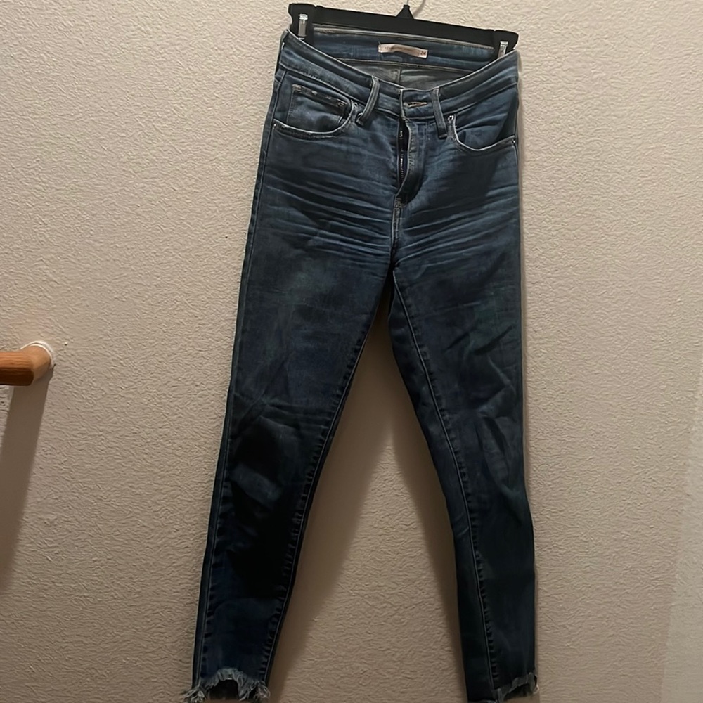 Levi 721 High Rise Skinny Jeans ripped bottoms